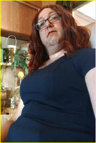 Sissy Keith in long brown wig