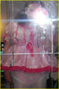 Scottish sissy Cassie in frilly pink little girl dress